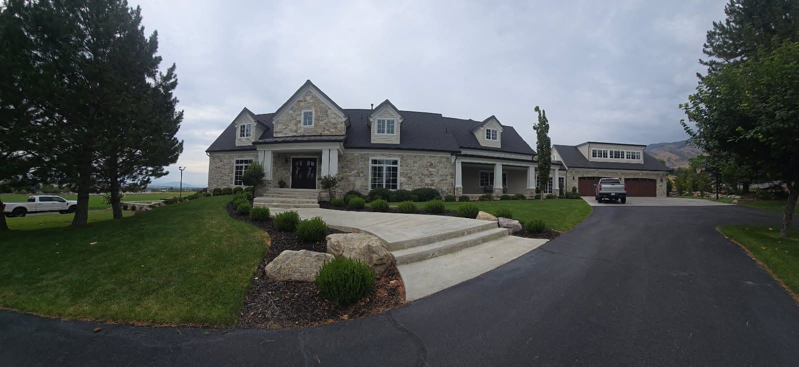 Stone-Finished Remodel with Tennis Court image