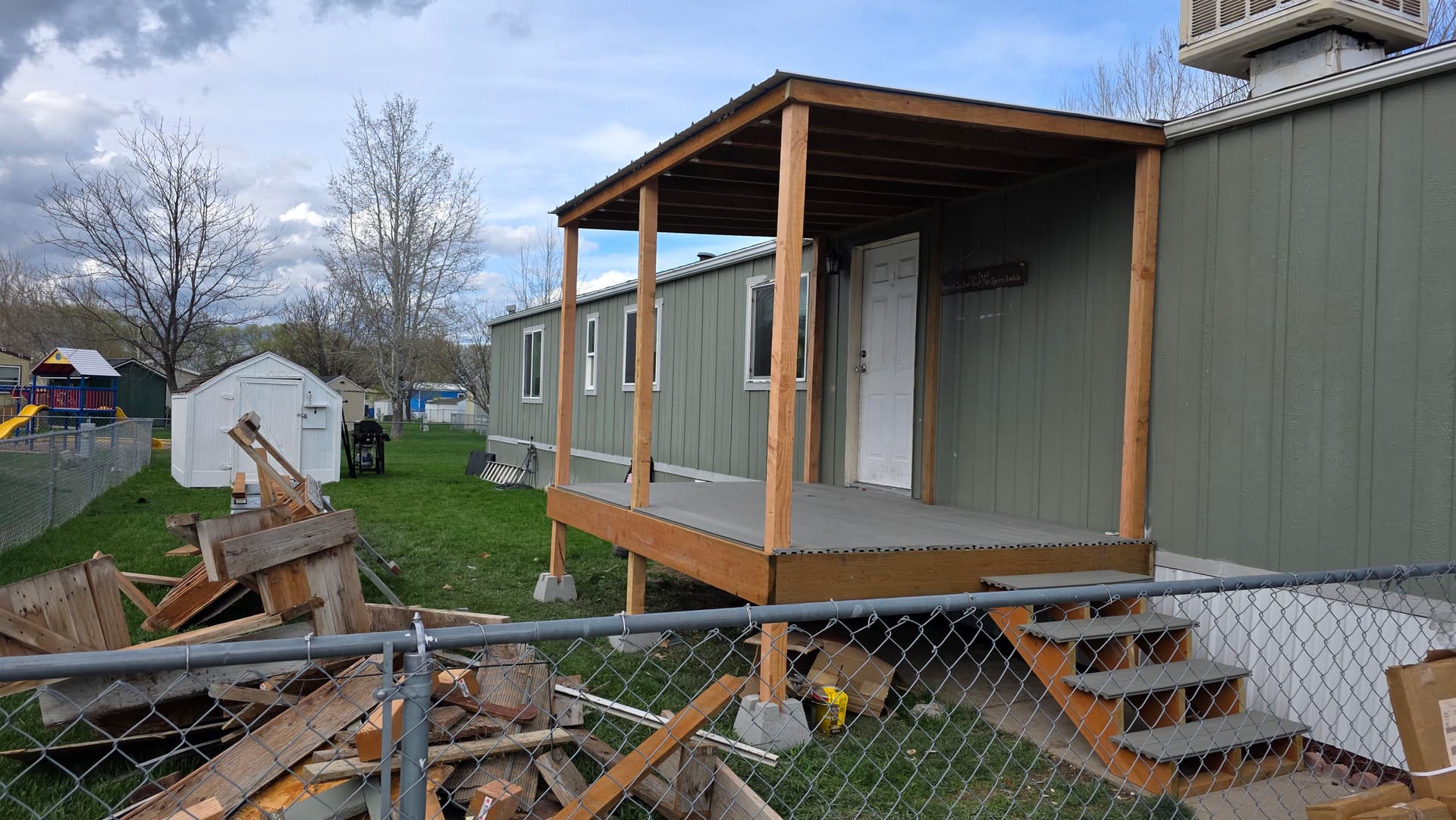Gallery photos for Worn-Out Porch Rebuilt Into a Covered Deck in One Day: Image #2